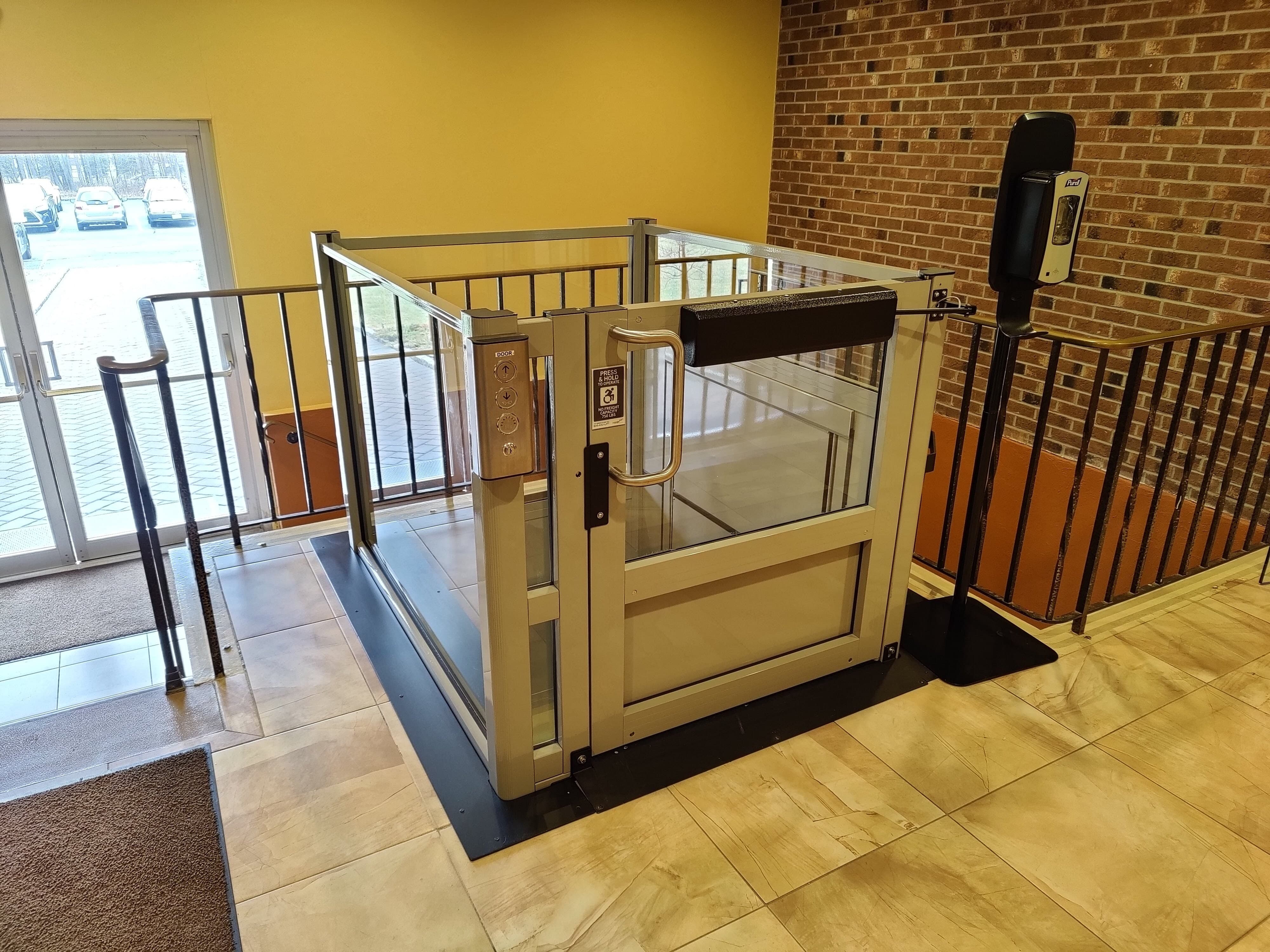 Standard Enclosure Vertical Platform Wheelchair Lifts 24